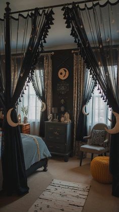 a bed room with a neatly made bed and curtains