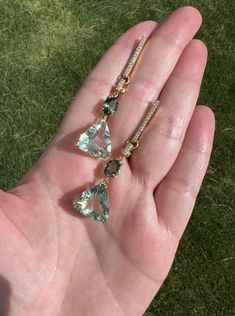 Make them green with envy! These earrings are magnificent. They feature flourite, green tourmaline and diamond all hand set in 14k yellow gold. Green With Envy, Green Tourmaline, Tourmaline, Yellow Gold, Yellow, Green, Gold