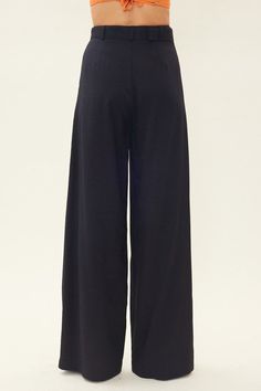 Our black high waisted wide leg trousers are made for comfort and style. The belted waist and front pleat detail provide a flattering fit and take your look to the next level. Effortless style and comfort combined. Front slant pockets 50% Rayon 50% Polyester Hand wash cold/Line dry Recommended sizing: S(2-4) M(6-8) L(10-12) Black Relaxed Fit High-waisted Wide Leg Pants, Black Wide-leg Dress Pants With Belt Loops, Black Wide-leg Pants With Belt Loops, Black Full-length Pants With Elastic Waistband, Black Pull-on Wide Leg Pants, Cowl Neck Cami, Satin Camisole, Black Wide Leg Trousers, Beachy Boho