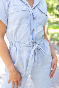 Our new Country Chic Jumpsuit is the perfect spring arrival! This light blue jumpsuit features a collared neckline, short sleeves, an elastic waistband, side pockets, and a cropped length. Dress this one up or down! cotton hand wash with cold water hang to dry Model is wearing a size small Light Blue Cotton Summer Jumpsuits And Rompers, Light Blue Cotton Jumpsuits And Rompers For Summer, Light Blue Cotton Summer Jumpsuit, Light Blue Fitted Jumpsuit With Short Sleeves, Blue Jumpsuits And Rompers With Elastic Waistband For Spring, Collared Blue Jumpsuits And Rompers For Spring, Blue Collared Jumpsuits And Rompers For Spring, Light Blue Cotton Jumpsuits And Rompers For Spring, Casual Collared Cotton Jumpsuits And Rompers