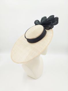 Classic boater in natural and black. Black Brimmed Boater Hat For Formal Occasions, Black Formal Boater Hat With Flat Brim, Formal Black Boater Hat With Flat Brim, Formal Black Boater Hat With Curved Brim, Beige Boater Hat For Evening With Short Brim, Chic Beige Boater Hat With Flat Brim, Chic Black Boater Hat For Summer, Black Boater Hat With Short Brim For Evening, Chic Black Mini Hats For The Beach