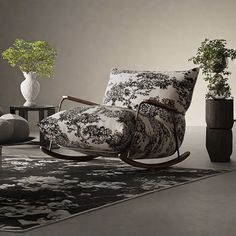 a living room with a rocking chair and vases filled with flowers on the floor