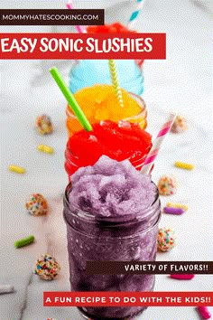 three glasses filled with different colored drinks on top of a white table next to confetti and sprinkles