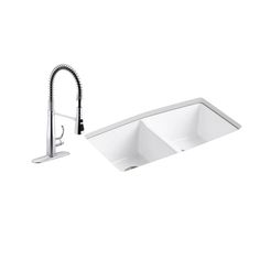 a white kitchen sink and faucet on a white background, with the faucet