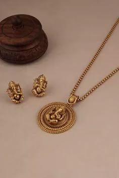 Shop for Smars Jewelry Lord Ganesha Carved Pendant Necklace Jewellery Set Online at Aza Fashions Indian God Jewellery, Ganesha Pendant Gold Jewelry, Mens Gold Chain With Pendant, Ganesha Pendant For Men, Ganpati Locket Gold, Pendant Set Gold Indian, Pendant And Earrings Set Gold, Pendant Designs Gold Simple, Gold Jewelry Simple Necklace Indian