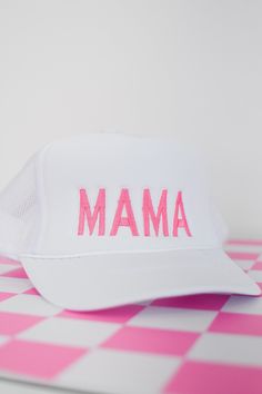 Be a stylish mama on the go with our MAMA embroidered trucker hat! This pink and white adjustable hat is perfect for any busy mom, adding a touch of fun and flair to their outfit. Stay cool and fashionable while representing motherhood with our MAMA hat. Product Details: adjustable foam terry material lining comfortable White Trucker Hat With Embroidered Logo For Spring, Spring Snapback Hat With Letter Print, White Embroidered Trucker Hat With Curved Brim, White Trucker Hat For Spring, Spring White Dad Hat With Embroidered Logo, Personalized Casual Trucker Hat For Summer, Summer White Trucker Hat With Embroidered Logo, White Dad Hat With Embroidered Logo For Spring, White Embroidered Logo Trucker Hat For Summer