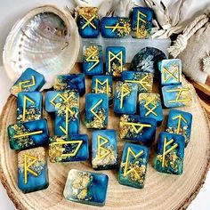 blue and gold dices with symbols on them