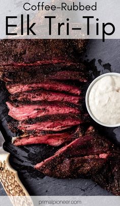 the steak is sliced up and ready to be served with ranch sauce on top, next to a knife