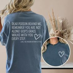 Dear Person Behind Me Comfort Colors Shirt: Motivational Faith Tee - Dear Person Behind Me Comfort Colors shirt features motivational words on the back, reminding everyone that God's grace walks with them every step. This oversized tee is perfect for spreading kindness and faith wherever you go. Whether you're walking by faith or inspiring others, this trendy faith-based shirt is a must-have addition to your wardrobe. Perfect for walk by faith gifts. Check out this t-shirt and more at: stormyvis Inspirational Crew Neck Shirt With Relaxed Fit, Inspirational Long Sleeve Cotton T-shirt, Inspirational Crew Neck Tops With Letter Print, Inspirational Short Sleeve Tops With Letter Print, Inspirational Slogan Tops With Relaxed Fit, Inspirational Relaxed Fit Tops With Slogan, Inspirational Text Print Relaxed Fit Top, Relaxed Fit Inspirational Slogan Tops, Inspirational Text Print Tops With Relaxed Fit