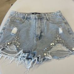 Shorts | 26 Rhinestone Shorts | Poshmark Trendy Mid-rise Bottoms With Rhinestones, Casual Rhinestones Bottoms For Spring, Glamorous Summer Denim Bottoms, Party Denim Jean Shorts With Rhinestones, Rhinestone Denim Jean Shorts For Party, Denim Shorts With Rhinestones For Summer, Summer Denim Shorts With Rhinestones, Trendy Rhinestone Bottoms For Night Out, Mid-rise Bottoms With Rhinestones For Spring