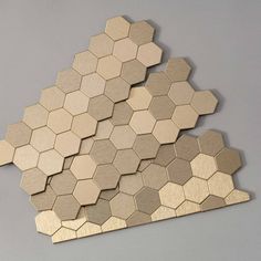 several wooden hexagons arranged on top of each other in the same pattern