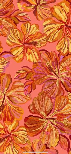 an orange and yellow flower pattern on a pink background