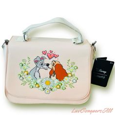 Loungefly Disney Lady And The Tramp Kissing Scene Crossbody Product Detail: Pearl And Floral Detailing Removable Crossbody Strap Polyurethane; Polyester Approx. 11" W X 8" H X 4 3/4" D New With Tags ***Sold Out And Out Of Stock*** ***Firm Price*** Disney Lady And The Tramp, Kissing Scene, Backpacks Accessories, Loungefly Bag, Loungefly Disney, Lady And The Tramp, Disney Ladies, Crossbody Strap, Crossbody Bag