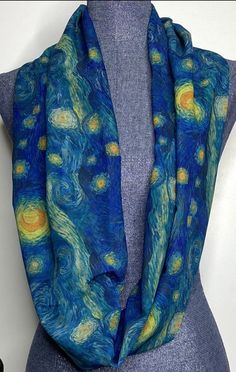 Starry night sky, Van Gogh sky. Soft, lightweight, fabric. Light enough to wear in the summer. Stylish enough to wear any time. Folded and sewn in a continuous loop. - 53 inch loop - 9 Inches wide when laid flat - Chiffon Artsy Blue Scarf Perfect As A Gift, Artsy Blue Scarf As A Gift, Artsy Blue Scarf As Gift, Artsy Blue Scarf For Gift, Artsy Blue Scarves As Gifts, Van Gogh Wallpaper, Van Gogh Gifts, Parade Dress, Scarf Art