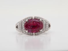 A brand new AGL (Thai) certified 3.56 burma ruby no heat purplish red and diamond ring in 18 karat gold . The ruby weigh 3.56 carat and diamond weigh 0.39 carat. The total ring weight is 4.87 grams. The ring size US 5.50 and EU 51. Luxury Ruby Diamond Ring With Pave Setting, Oval Ruby Diamond Ring With Pave Setting, Oval Ruby Ring With Pave Setting, Classic Red Diamond Ring With Pave Setting, Ruby Ring With Pave Setting As Gift, Ruby Ring With Pave Setting, Formal Ruby Ring With Pave Setting And Round Cut, Red Oval Diamond Ring With Pave Setting, Red Ruby Ring With Diamond And Pave Setting