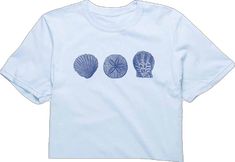 Blue Crew Neck Tops For Beach Season, Blue Crew Neck Top For Beach, Light Blue Crew Neck Beach T-shirt, Light Blue Crew Neck T-shirt For Beach, Blue Graphic Print Tops For Beach Season, Blue Tops For Beach Season, Blue Beachy Tops With Graphic Print, Blue Graphic Print Beach Top, Light Blue Graphic Print Vacation Top