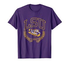 PRICES MAY VARY. Officially Licensed Louisiana State University apparel. Show your support for the Tigers with this LSU logo apparel! The soft material and digitally printed logo make this a great addition to any LSU apparel collection! Geaux Tigers! Wear this fan favorite LSU Tigers apparel to the big game or just hanging out around the house. The unique vintage logo will let everyone know your affiliation with LSU! Lightweight, Classic fit, Double-needle sleeve and bottom hem Lsu Apparel, Lsu Logo, Lsu Outfits, University Apparel, Geaux Tigers, Louisiana State University, Louisiana State, Purple T Shirts, Lsu Tigers