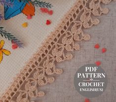 the crochet pattern has been made to look like flowers and butterflies on it