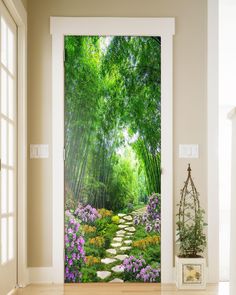 an open door with a garden scene painted on it