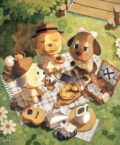 a picnic with dogs and food on the ground