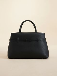 Introducing the latest addition to the Manu Atelier signature pieces, the Le Cambon 35 - a fusion of simplicity and artistry crafted to effortlessly fit into your daily life. Designed with calf skin leather, this bag blends sophistication with practicality, accommodating a 13-inch MacBook and offering a spacious, softly structured shape for all your essentials. Evolved from the design of Tote du Jour, it transforms the daily bag into a more classic and sophisticated version. With refined contour Pointy Toe Boots, Daily Bag, Passport Case, Flat Boots, Mini Tote, Toe Sandals, Small Leather Goods, Summer Shoes, Daily Life