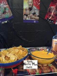 a table topped with bowls filled with food next to a sign that reads randy nocchine man cheese