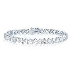 Stunning with scintillating sparkle, this s-link lab-created white sapphire line bracelet is alluring in every way. Fifty-four round lab-created white sapphires offer shimmer and shine from sterling silver. | S-Link Lab-Created White Sapphire Line Bracelet | Sterling Silver | Size 6.00mm | Helzberg Diamonds Sterling Silver Diamond White Round Cut Bracelets, Modern White Tennis Bracelet For Anniversary, Diamond White Channel Set Tennis Bracelet For Anniversary, Diamond White Tennis Bracelet With Channel Set For Anniversary, Luxury White Sterling Silver Diamond Bracelet, Elegant White Round Cut Sterling Silver Bracelet, Dazzling White Brilliant Cut Sterling Silver Bracelet, Luxury Diamond White Sterling Silver Bracelet Round Cut, Helzberg Diamonds