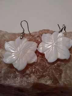 2 Beautiful white Paua shells shaped like flowers, make  a  gorgeous pair of earrings Nickel Free White Drop Earrings, Nickel-free White Drop Earrings, Handmade White Earrings In Mother Of Pearl, White Mother Of Pearl Earrings, White Dangle Flower Charm Earrings, White Pierced Earrings As A Gift, White Drop Earrings With Flower Charm, White Pierced Earrings For Gift, White Dangle Flower Earrings With Charm