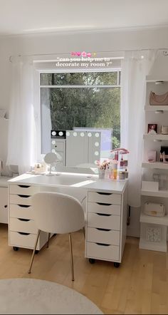 a white desk sitting in front of a window