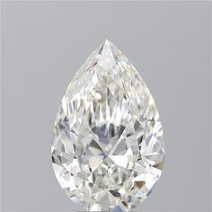 a pear shaped diamond is shown against a gray background