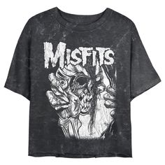 Celebrate the legendary horror-punk band and pop culture icons, The Original Misfits with officially licensed apparel featuring the classic "Fiend Skull" and more! This Juniors' Misfits Distressed Eye Skull Cropped Graphic T-Shirt features an epic, distressed graphic of a skull holding out an eyeball in white with the classic Misfits logo in matching white lettering printed above. Rock out to the genre-defining Misfits in ultimate style with these fun new tees for everyone! Misfits Logo, Pop Culture Icons, Horror Punk, Emo Aesthetic, Cowl Neck Sweatshirt, Skull T Shirt, Sleeve Packaging, Punk Bands, Graphic Tee Design