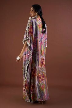 Multi colored longline kaftan in crepe base with African prints, embroidered highlights and thread tassel details. - Aza Fashions Multicolor Silk Kaftan With Resham Embroidery, Multicolor Resham Embroidered Kaftan With Traditional Drape, Multicolor Kaftan With Resham Embroidery, Multicolor Resham Embroidery Kaftan With Traditional Drape, Traditional Kaftan With Tassels, Festive Multicolor Printed Kaftan, Embroidered Silk Maxi Length Kaftan, Summer Multicolor Tassel Sets, Bohemian Georgette Dresses With Printed Motifs