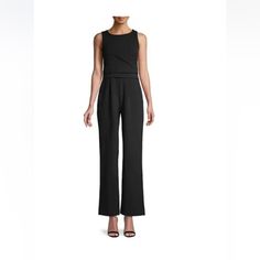 Details: Timeless Wide-Leg Jumpsuit In A Solid Hue With A Tiered Waist. Boatneck Sleeveless Concealed Back Zip Side Seam Pockets Polyester/Spandex Dry Clean Imported Size & Fit Rise, About 11" Inseam, About 31" Leg Opening, About 24" About 58" From Shoulder To Hem Model Shown Is 5'10" (177cm) And Wearing Us Size 4 Fitted Calvin Klein Jumpsuits And Rompers For Party, Formal Solid Color Strapless Sleeveless Jumpsuit, Sleeveless Pantsuit For Evening, Sleeveless Jumpsuits And Rompers For Evening, Elegant Sleeveless Solid Color Pantsuit, Sleeveless Formal Pantsuit, Sleeveless Solid Pantsuit For Night Out, Black Fitted Sleeveless Pantsuit, Sleeveless Solid Color Workwear Pantsuit