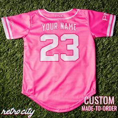 Rush Python Nu Kappa with this one-of-a-kind jersey! This custom full-button baseball jersey is perfect for all Monsters fans or your next trip to your favorite theme park! Free PersonalizationAdd your own name and number - custom personalization is free. *If you do not specify a custom name and number in the boxes above, your jersey will not include a name and number.* College Baseball Jersey For Baseball Season With School Spirit, College Baseball Jersey For Baseball Season, Casual Pink Jersey For Game Day, School Spirit Baseball Jersey With Team Name, Pink Baseball Jersey For Sports Events With Team Spirit, Pink College Jersey With Team Spirit Style, Pink Team Spirit Jersey For College, Pink Team Spirit Baseball Jersey For Sports Events, Varsity Style Baseball Jersey For Baseball Season