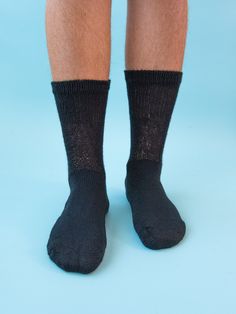 World’s Softest® fiber and the widest fit – we know that painful legs and feet can be miserable. We want to do what we can to try to keep your feet comfortable and happy. You should not suffer through tight fitting socks just to experience our amazing softness. Every foot deserves to be treated with only the best! This sock is specifically designed for those with excessive swelling and sensitive feet and legs – this sock will cover you, but not hug you. Available in 3 sizes:Medium: Women's Shoe Breathable Supportive Comfortable Socks, Casual Black Socks For Everyday, Black Casual Everyday Socks, Casual Black Everyday Socks, Black Lightweight Casual Socks, Lightweight Black Casual Socks, Lightweight Casual Black Socks, Comfortable Slip-resistant Socks, Casual Lightweight Black Socks