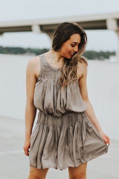 Pleated, sleeveless dress with cinched waist. Reagan is wearing a size smallSkirt portion is linedSize Chart:Small: Waist: 26 in. Bust: 34 in.Medium: Waist: 28 in. Bust: 36 in. Large: Waist: 30 in. Bust: 38 in. HEY BABE! WE ONLY OFFER STORE CREDIT FOR RETURNS! Feel free to email us or DM us on Instagram with any questions regarding fit or sizing or our return policy in general. Sleeveless Mini Dress With Smocked Bodice For Vacation, Sleeveless Smocked Bodice Mini Dress For Vacation, Spring Knee-length Mini Dress With Pleated Waist, Summer Dresses With Gathered Waist For Daywear, Chic Beach Dress With Pleated Waist, Knee-length Sundress With Smocked Back, Knee-length Smocked Back Sundress, Sleeveless Summer Dress With Smocked Bodice, Sleeveless Dresses With Smocked Bodice For Daywear