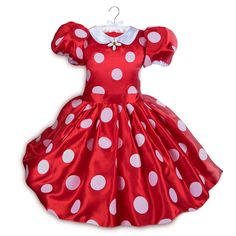 a red dress with white polka dots on it