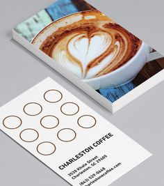 a business card with coffee art on it