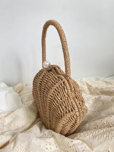 Chic and stylish, the Elena Handbags Summer Straw Shell Shape Shoulder Purse is a luxurious addition to your accessories. Crafted from straw and beautifully shaped like a seashell, this purse is an exquisite blend of form and function. Its elegant design makes it the ideal accessory for a day in the city or an evening on the beach. Size: 23cm wide x 15cm tall (9in x 6in) Designer Style ID: 8473 Elegant Beige Beach Bag For Summer, Elegant Spring Beach Bag, Elegant Beige Beach Season Bags, Elegant Beige Crochet Bag For Beach Season, Elegant Spring Natural Beach Bag, Elegant Straw Travel Bag, Elegant Straw Beach Bag For Spring, Elegant Straw Shoulder Bag For Summer, Elegant Spring Beach Bag In Natural Color