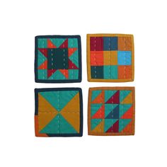 three square patchwork coasters in different colors