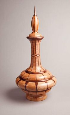 a wooden vase sitting on top of a table