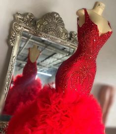 Red Gown For Pageant During Prom Season, Red Fitted Organza Gown, Red Organza Evening Dress For Prom, Red Sleeveless Gown For Pageant, Red Sleeveless Gown For Pageants, Red Gown For Pageant And Prom Season, Glamorous Red Evening Dress With Ruffles, Red Embellished Gown For Prom Season, Red Ruffled Prom Evening Dress