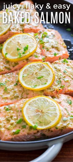 baked salmon with lemons and herbs in a skillet