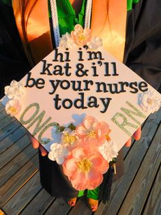 a decorated graduation cap that says i'm kate & i'll be your nurse today