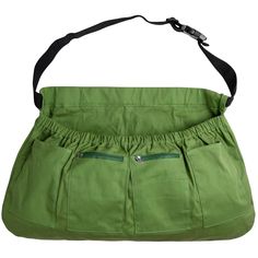 a green purse with two zippers on the front and one in the back pocket