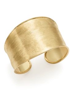 Subtle surface texture lends a brushed-metal glow to this classically opulent 18K gold cuff from Marco Bicego. Marco Bicego Jewelry, New Zealand Jewellery, Engraved Cuff, Gold Cuff Bracelet, Marco Bicego, Cuff Jewelry, Yellow Gold Jewelry, Gold Cuffs, Jewelry Lookbook