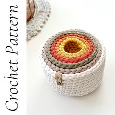 there is a basket that has different colors on it and the words crochet pattern below it