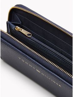 Tommy Hilfiger women's wallet. Keep a sleek profile with our zip-around wallet in a clean, classic silhouette. Inside, ample room for your cards and currency.  Material: 100% Polyurethane. Tommy Wallet, Wallet For Women, Your Cards, Zip Wallet, Tommy Hilfiger Women, Classic Silhouette, Wallets For Women, Zip Around Wallet, Tommy Hilfiger