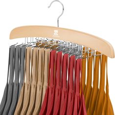 an umbrella is hanging on a wooden hanger