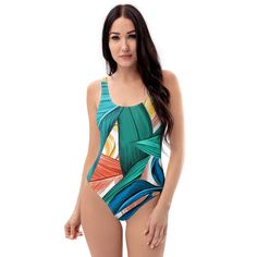 This one-piece swimsuit for all figures will bring out your best features. Enjoy the smooth fabric and the flattering flower design, and show it off by the sea or pool! Check out our Scrunchies - * 82% Polyester, 18% Spandex * Fabric weight: 6.78 oz/yd² (230 g/m weight may vary by 5% * Chlorine-resistant fabric * Cheeky fit with a scoop neckline and a low scoop back * Zig-zag stitching * Double-layer front  * Four-way stretch material stretches and recovers on the cross and lengthwise grains Tropical Green Bodysuit For Vacation, Tropical Green One-piece Swimsuit, Green Tropical One-piece For The Beach, Tropical Green Bodysuit For The Beach, Tropical Multicolor Bodysuit For Pool, Green Tropical One-piece For Beach, Green Swimwear For Surfing, Green Swimwear For Surfing In Spring, Green Surfing Swimwear For Spring